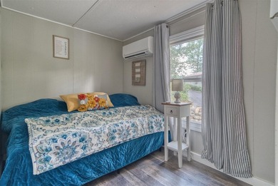 Updated, well-maintained 2-bed 1-bath mobile lakefront home on - photo 9
