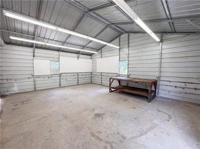 Situated on just over one acre, this well-maintained 3-bedroom - photo 20