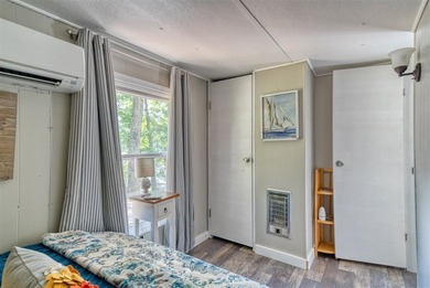 Updated, well-maintained 2-bed 1-bath mobile lakefront home on - photo 10