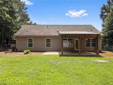 Situated on just over one acre, this well-maintained 3-bedroom - photo 22