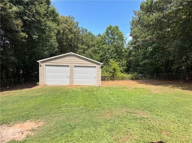 Situated on just over one acre, this well-maintained 3-bedroom - photo 24