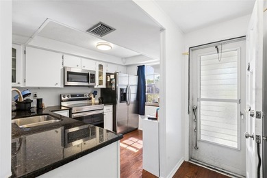 Step into this beautifully updated 2 bedroom, 2 bath corner unit - photo 5