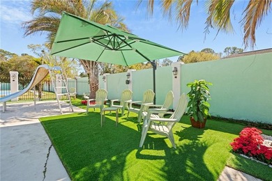 This gated estate offers a lavish, resort-style atmosphere where - photo 3