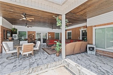 This gated estate offers a lavish, resort-style atmosphere where - photo 9