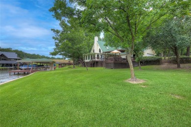 The PERFECT Lake house! This fabulous waterfront home on Lake - Lake Home For Sale in Scroggins, Texas