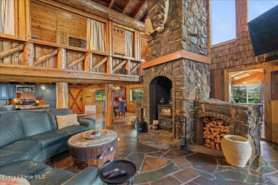 Set on 9.81 private acres with rare dual lake views of Fernan - photo 3