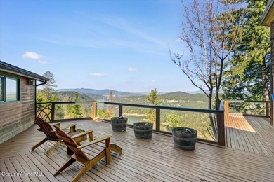 Set on 9.81 private acres with rare dual lake views of Fernan - photo 6