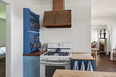 Discover this beautifully reimagined cottage in the heart of - photo 11