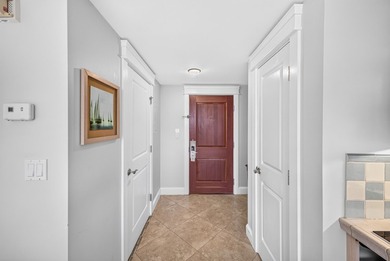 Perched on the 5th floor, this bay-facing studio offers stunning - photo 12