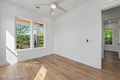 Enjoy coastal living on the beautiful Biloxi Back Bay in this - photo 13