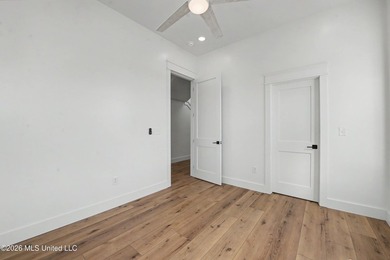 Enjoy coastal living on the beautiful Biloxi Back Bay in this - photo 14