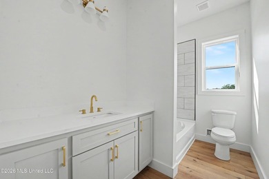 Enjoy coastal living on the beautiful Biloxi Back Bay in this - photo 15