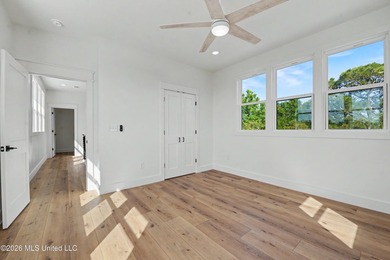 Enjoy coastal living on the beautiful Biloxi Back Bay in this - photo 19