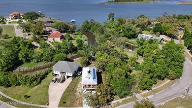 Enjoy coastal living on the beautiful Biloxi Back Bay in this - photo 25
