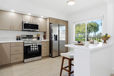 Stunning Lake & Golf Course Views. Fully Renovated Condo in