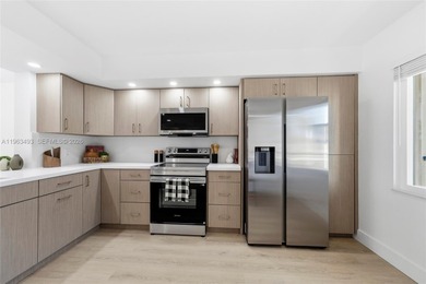 Stunning Lake & Golf Course Views. Fully Renovated Condo in