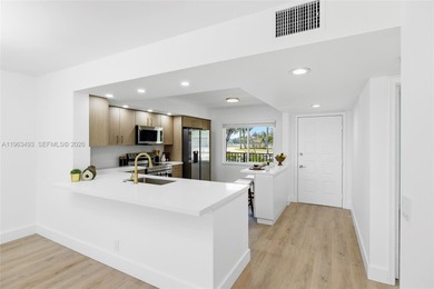 Stunning Lake & Golf Course Views. Fully Renovated Condo in