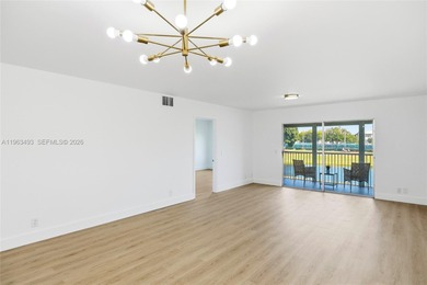 Stunning Lake & Golf Course Views. Fully Renovated Condo in