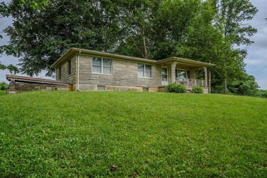 49+/- acres with a home, barns, road frontage, and room to grow - photo 1