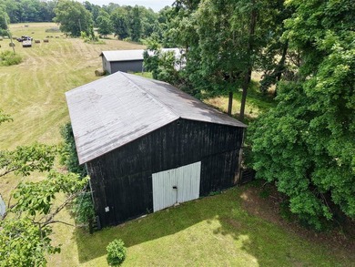 49+/- acres with a home, barns, road frontage, and room to grow - photo 7