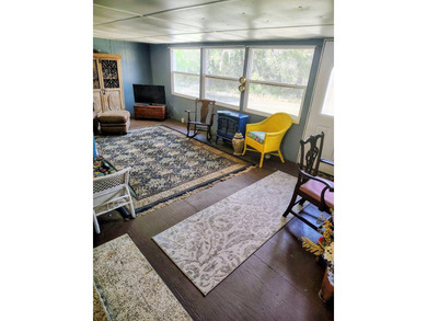 This charming 4-bedroom, 2-bath mobile home presents a fantastic - photo 15