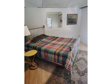 This charming 4-bedroom, 2-bath mobile home presents a fantastic - photo 16