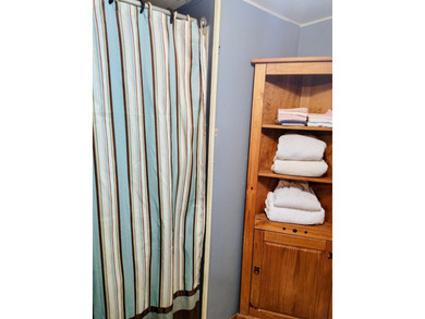 This charming 4-bedroom, 2-bath mobile home presents a fantastic - photo 19