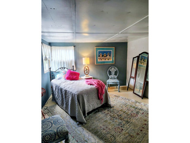 This charming 4-bedroom, 2-bath mobile home presents a fantastic - photo 23