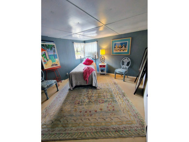 This charming 4-bedroom, 2-bath mobile home presents a fantastic - photo 24