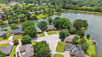 Tucked away on a cul-de-sac in a peaceful lakefront neighborhood - photo 2