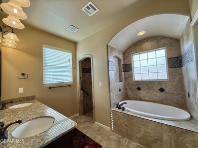 Beautiful single-story Cimarron home offering exceptional curb