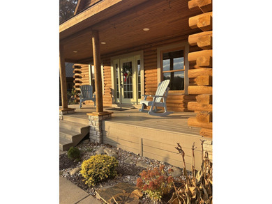 Beautiful cabin style lake front home with year round water! - photo 3