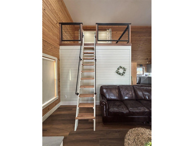 Beautiful cabin style lake front home with year round water! - photo 9