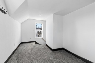 This updated contemporary city home features a convenient floor - photo 14