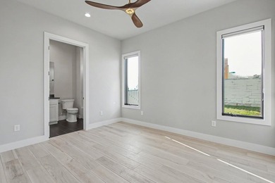 This stunning custom built home sits in the prestigious gated - photo 21