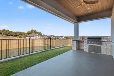 This stunning custom built home sits in the prestigious gated - photo 24