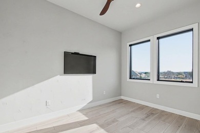 This stunning custom built home sits in the prestigious gated - photo 26