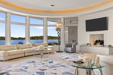 This 5BR Trillium estate redefines lake living. Over 850 ft of - photo 12