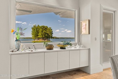 This 5BR Trillium estate redefines lake living. Over 850 ft of - photo 16