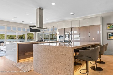 This 5BR Trillium estate redefines lake living. Over 850 ft of - photo 18