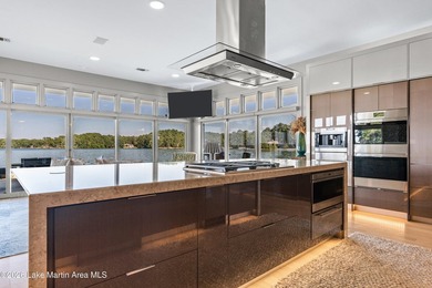 This 5BR Trillium estate redefines lake living. Over 850 ft of - photo 19