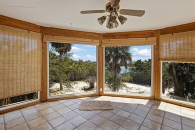 Tucked away on a private waterfront peninsula in historic Cedar - photo 21