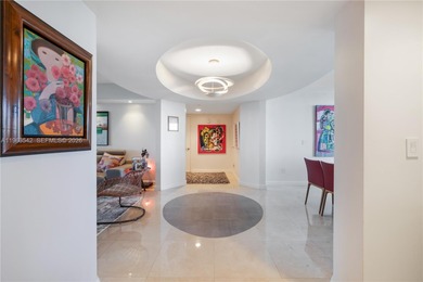 Experience refined coastal living in this impeccably maintained