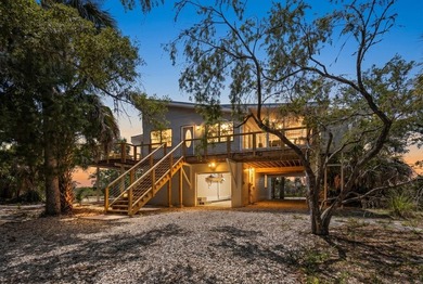 Tucked away on a private waterfront peninsula in historic Cedar - photo 26