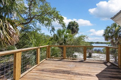 Tucked away on a private waterfront peninsula in historic Cedar - photo 27