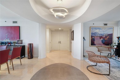 Experience refined coastal living in this impeccably maintained