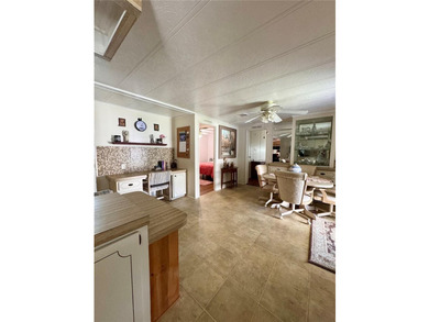 Enjoy peaceful canal-front living in Mariana Park, a 55+ - photo 7