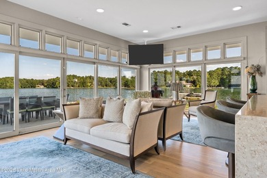 This 5BR Trillium estate redefines lake living. Over 850 ft of - photo 28