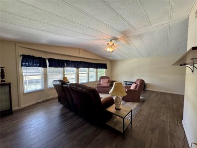 Enjoy peaceful canal-front living in Mariana Park, a 55+ - photo 8