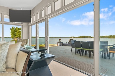 This 5BR Trillium estate redefines lake living. Over 850 ft of - photo 29